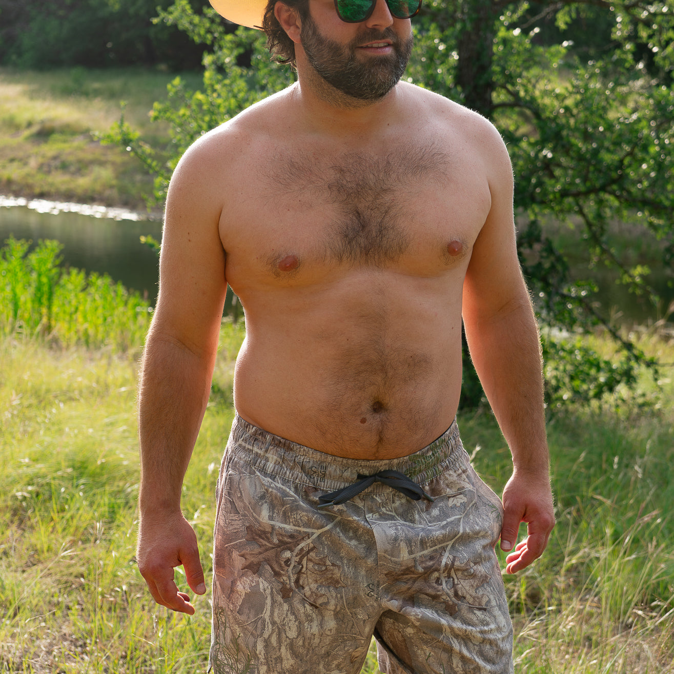Man wearing camo swim trunks