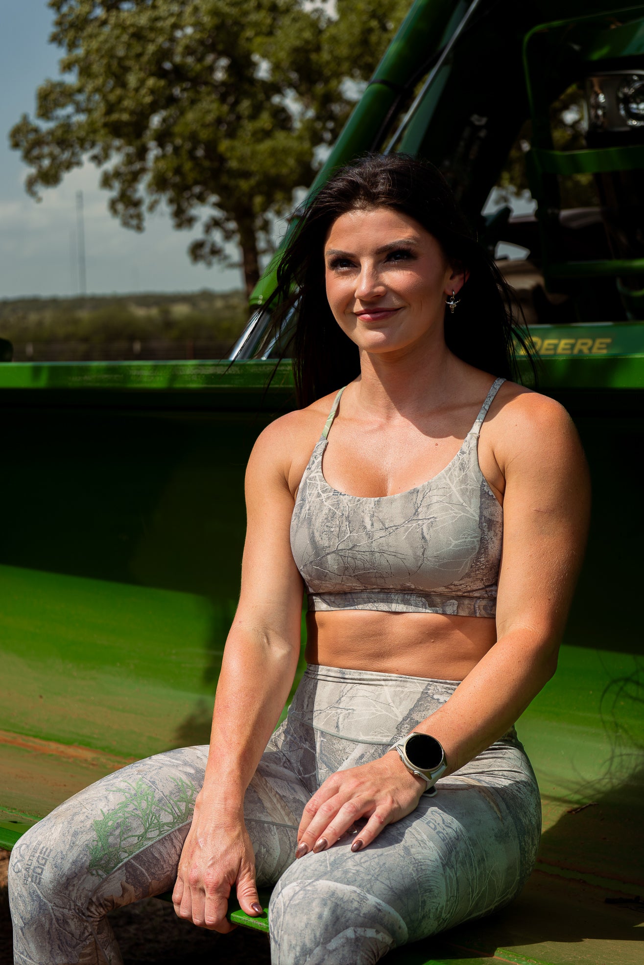 Woman wearing Camo Sports Bra and leggings