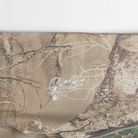 Closeup of "Get Bit!" logo on camo leggings