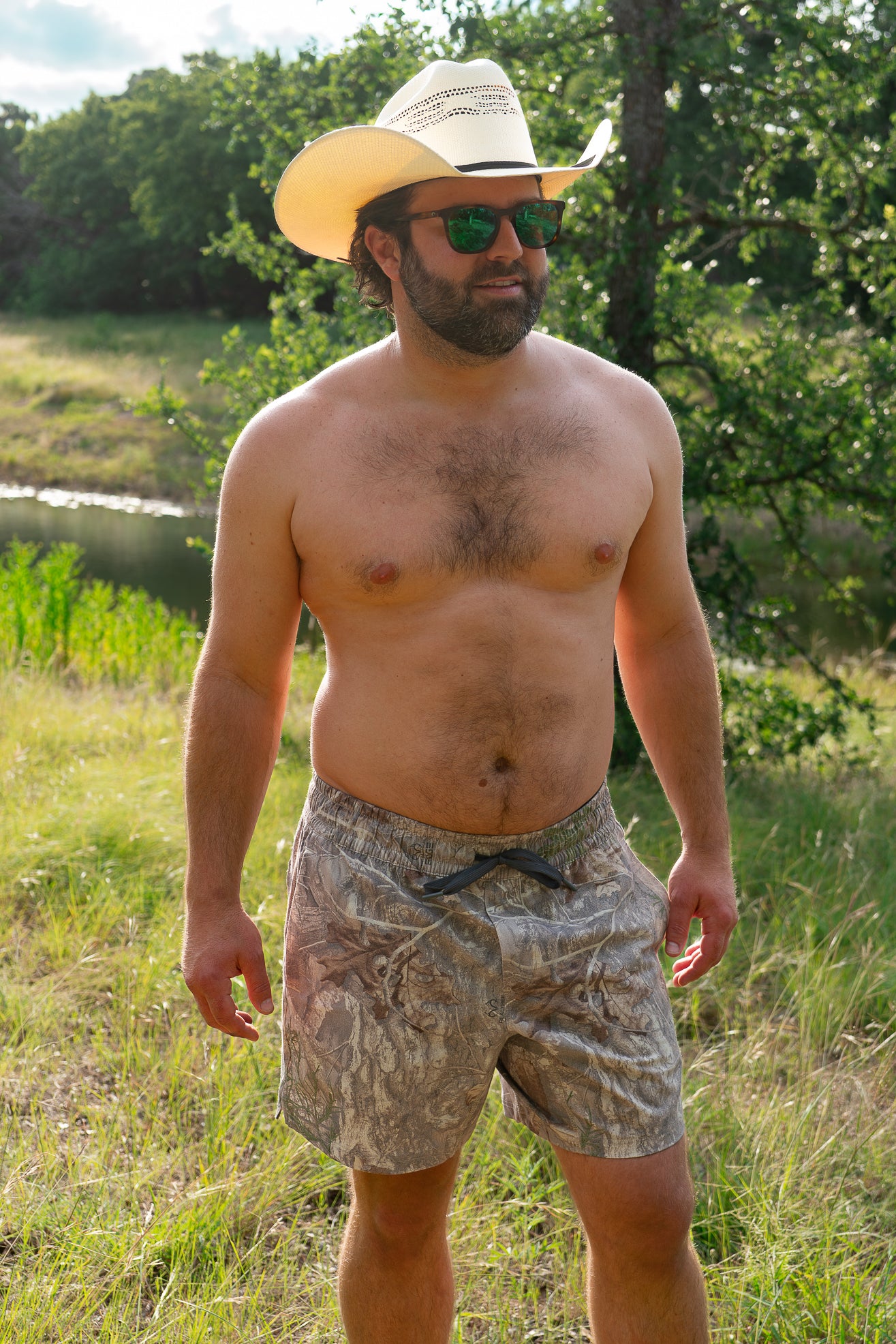 Man wearing camo swim trunks