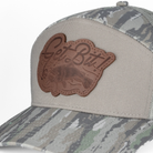 Camouflage cap with a brown patch displaying 'Get Bit!' on a white background