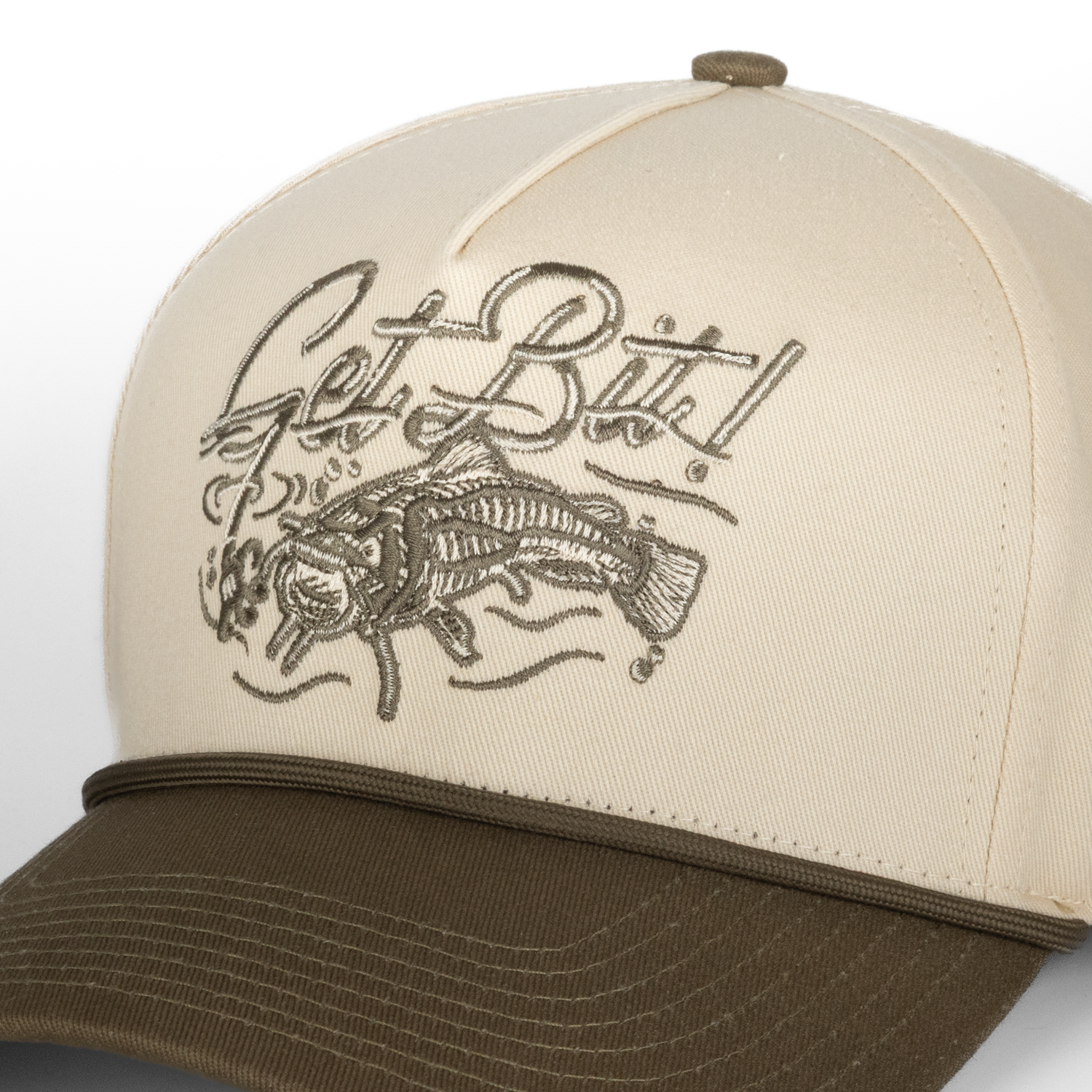 closeup of get bit logo on Natural/Olive hat